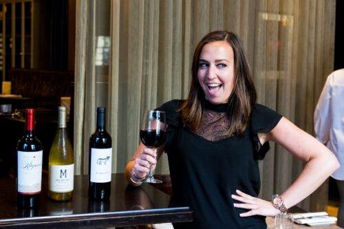 Maddy, Manager at City Table, with wine selections