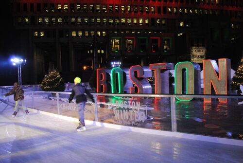 Skaters enjoying the Boston Winter skating rink in City Hall Plaza