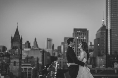 Bride and groom on roof