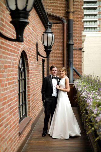 Bride and Groom Outside Their Wedding Venue