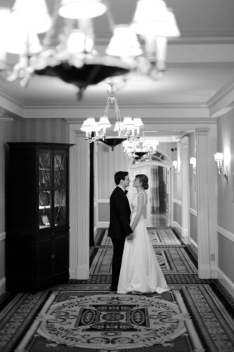 Bride and Groom in hallway of their Wedding Venue